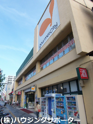 スーパー：ｸﾞﾙﾒｼﾃｨ 八幡町店　335m
